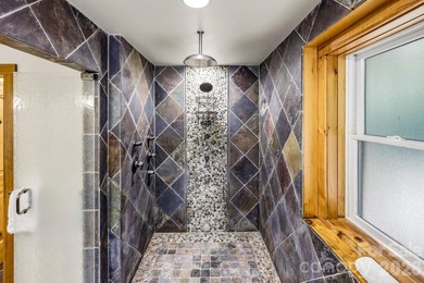 Stunning custom log home nestled on over 3 acres in the shadow - photo 19