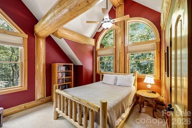 Stunning custom log home nestled on over 3 acres in the shadow - photo 25