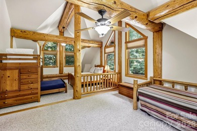 Stunning custom log home nestled on over 3 acres in the shadow - photo 26