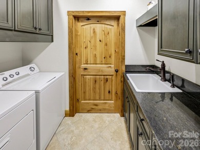 Stunning custom log home nestled on over 3 acres in the shadow - photo 32