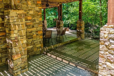 Stunning custom log home nestled on over 3 acres in the shadow - photo 38
