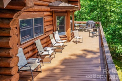 Stunning custom log home nestled on over 3 acres in the shadow - photo 39