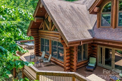 Stunning custom log home nestled on over 3 acres in the shadow - photo 41