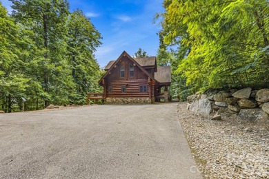 Stunning custom log home nestled on over 3 acres in the shadow - photo 42