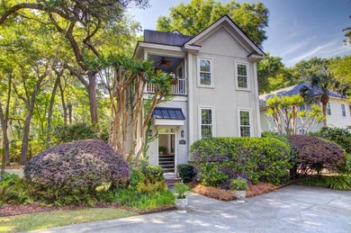 Nestled under mature oak trees and surrounded by gardens, you'll - photo 11
