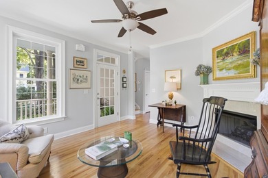 Nestled under mature oak trees and surrounded by gardens, you'll - photo 14