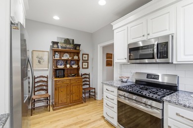 Nestled under mature oak trees and surrounded by gardens, you'll - photo 21