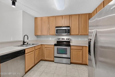 Welcome home to this beautifully maintained end-unit condo in - photo 22