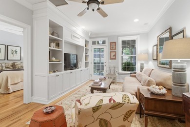 Nestled under mature oak trees and surrounded by gardens, you'll - photo 24