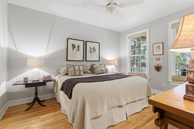Nestled under mature oak trees and surrounded by gardens, you'll - photo 28