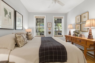 Nestled under mature oak trees and surrounded by gardens, you'll - photo 29