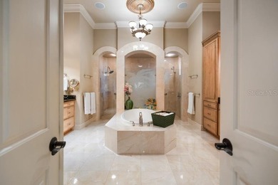 Expansive, gated, waterfront family estate meets effortless - photo 29