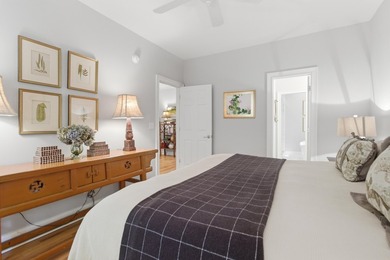 Nestled under mature oak trees and surrounded by gardens, you'll - photo 30