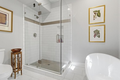Nestled under mature oak trees and surrounded by gardens, you'll - photo 32