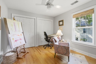 Nestled under mature oak trees and surrounded by gardens, you'll - photo 34
