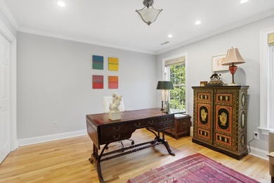 Nestled under mature oak trees and surrounded by gardens, you'll - photo 35