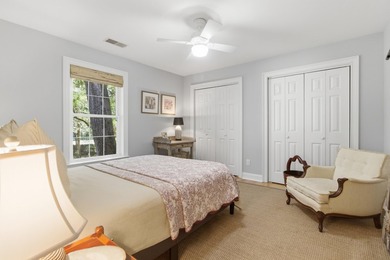 Nestled under mature oak trees and surrounded by gardens, you'll - photo 37