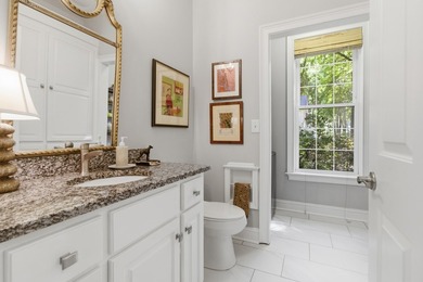 Nestled under mature oak trees and surrounded by gardens, you'll - photo 39
