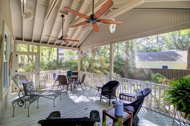 Nestled under mature oak trees and surrounded by gardens, you'll - photo 41