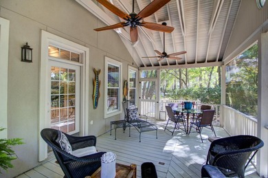 Nestled under mature oak trees and surrounded by gardens, you'll - photo 43