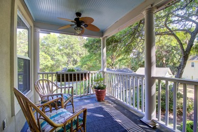 Nestled under mature oak trees and surrounded by gardens, you'll - photo 44