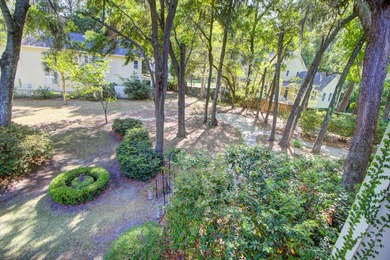 Nestled under mature oak trees and surrounded by gardens, you'll - photo 46