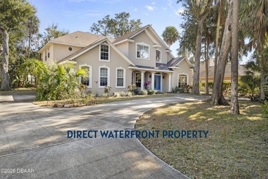 Custom built home! This exceptional waterfront estate is located - photo 2