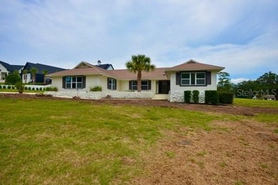 Inside, the home has been thoughtfully updated with an open - photo 1
