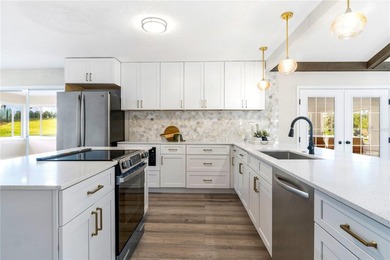 Inside, the home has been thoughtfully updated with an open - photo 7
