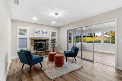 Inside, the home has been thoughtfully updated with an open - photo 8