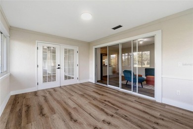 Inside, the home has been thoughtfully updated with an open - photo 9