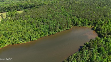 Discover the unmatched potential of this 34-acre wooded paradise - photo 12