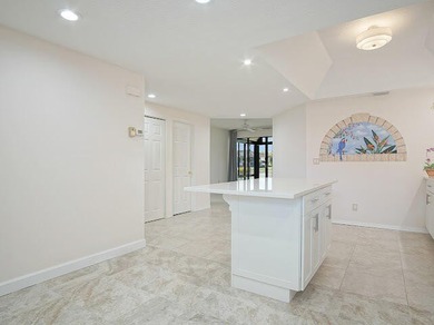 Beautifully updated 2BR/2BA first-floor condo with stunning lake - photo 23