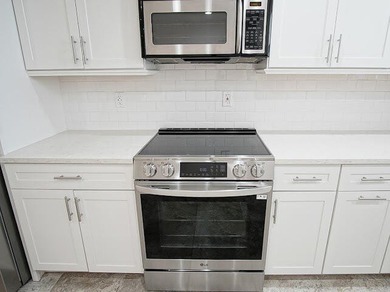 Beautifully updated 2BR/2BA first-floor condo with stunning lake - photo 24
