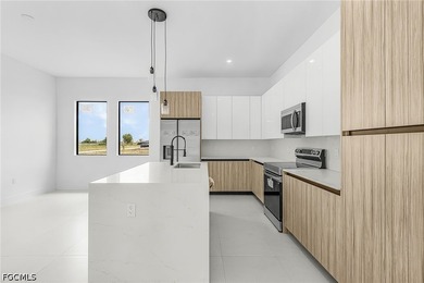 Welcome to this stunning luxury residence offering 1,927 SqFt of - photo 8