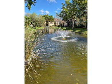 Lake Condo For Sale in Coral Springs, Florida