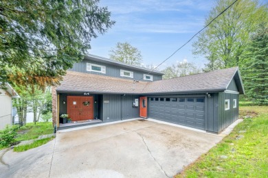 Lake Home For Sale in Canadian Lakes, Michigan