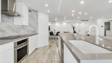 Welcome to this stunning turnkey 2-bedroom, 2-bathroom condo - photo 13