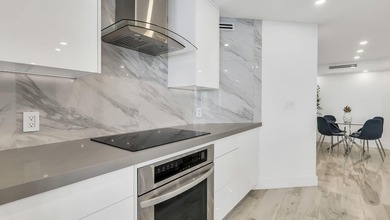 Welcome to this stunning turnkey 2-bedroom, 2-bathroom condo - photo 14