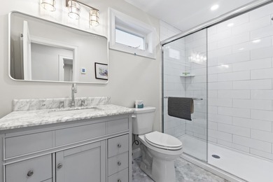 Enjoy refined seaside living with this exceptional dual-unit - photo 35