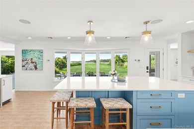 Nestled along the waterfront in East Quogue, 50 Sunset Avenue - photo 4