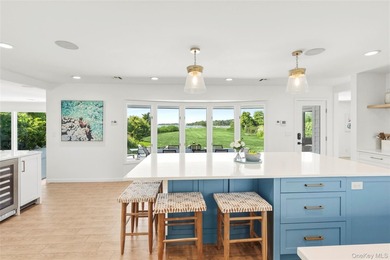 Nestled along the waterfront in East Quogue, 50 Sunset Avenue - photo 5