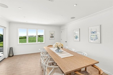 Nestled along the waterfront in East Quogue, 50 Sunset Avenue - photo 6