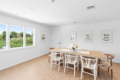 Nestled along the waterfront in East Quogue, 50 Sunset Avenue - photo 7