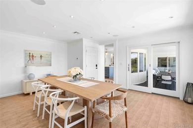 Nestled along the waterfront in East Quogue, 50 Sunset Avenue - photo 9