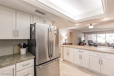 SUPER DEAL! Enjoy a modern 2-bed, 2-bath ground floor unit in - photo 3