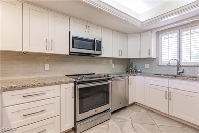 SUPER DEAL! Enjoy a modern 2-bed, 2-bath ground floor unit in - photo 8
