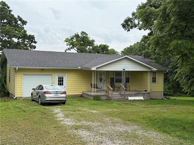 Solid 2-bedroom ranch on 1.5 acres with beautiful views and - photo 1