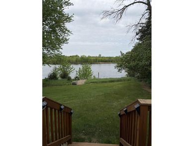 Enjoy peaceful riverfront living in this charming 2-bedroom - photo 3