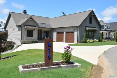 Experience lake living at The Reserve in this beautifully - photo 5